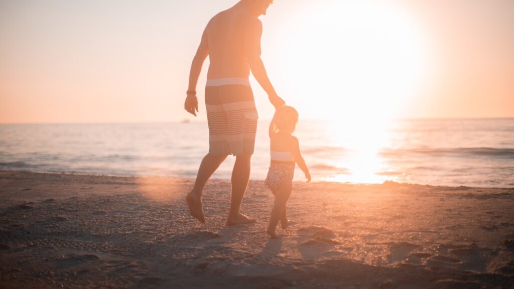 A parent and child walking together after a calm handoff