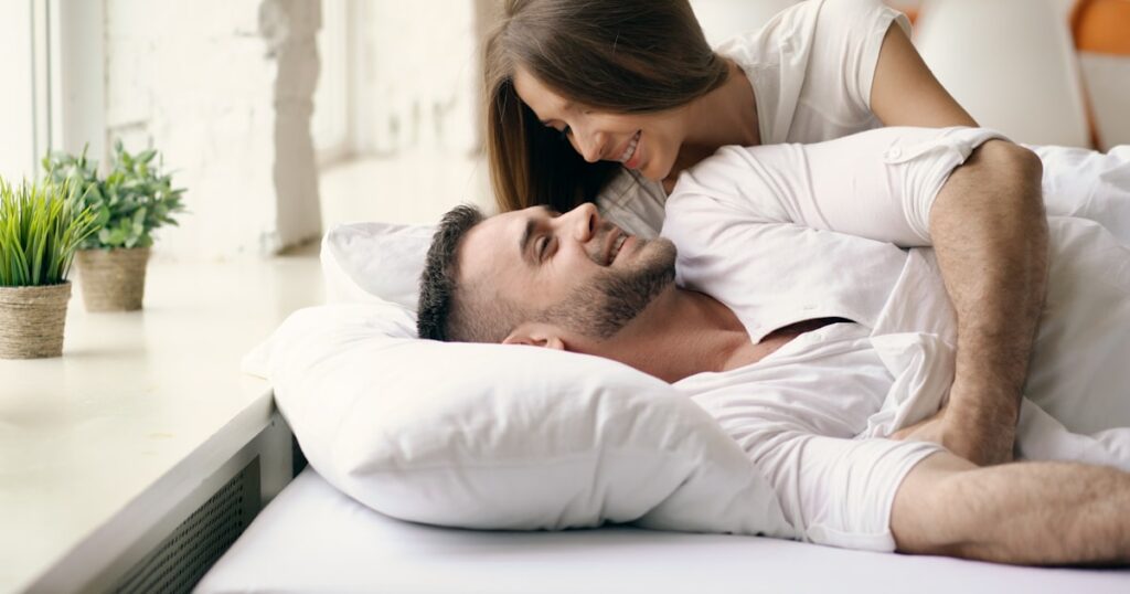 A couple waking together in bed, on mismatched libidos in a relationship