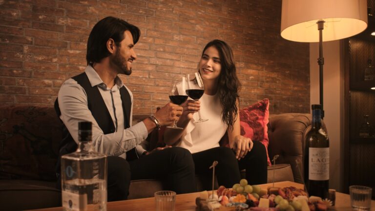 Couple sitting on a couch discussing how they connect