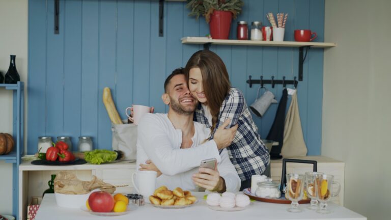 Couple cooking together in their kitchen