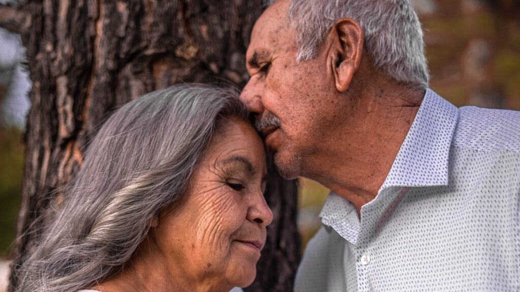 Married couple sharing a quiet affectionate moment