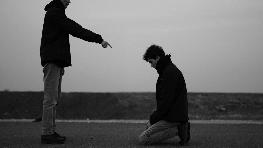 Couple in conflict outdoors, deciding whether to end things