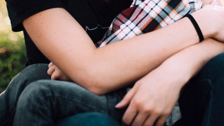 A parent practicing co-regulation with a distressed child