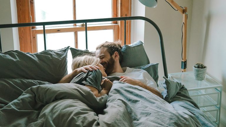 Destiny beliefs in marriage illustrated by a couple embracing tenderly