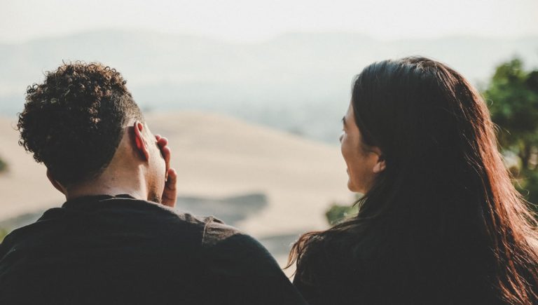 A couple standing close, symbolizing strong emotional permanence in relationships