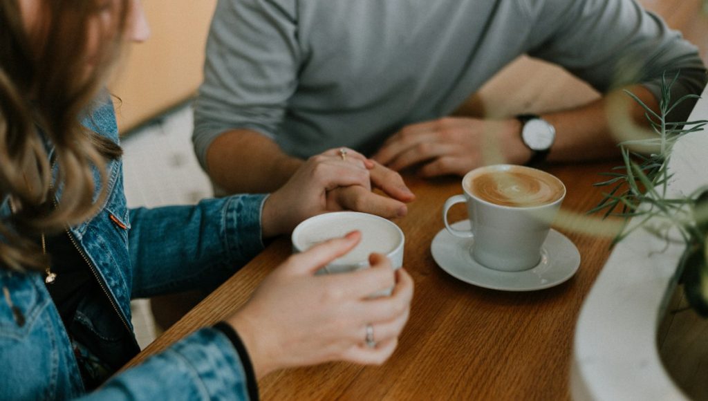 Two coffee cups symbolizing dating again after a breakup at your own pace