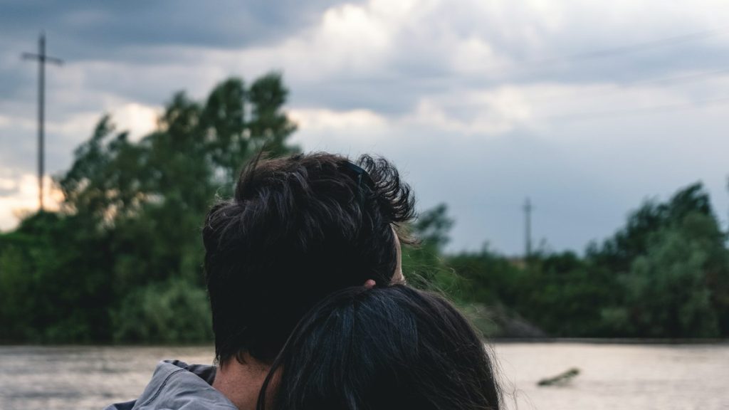 A pensive woman experiencing relationship OCD and intrusive relationship doubts